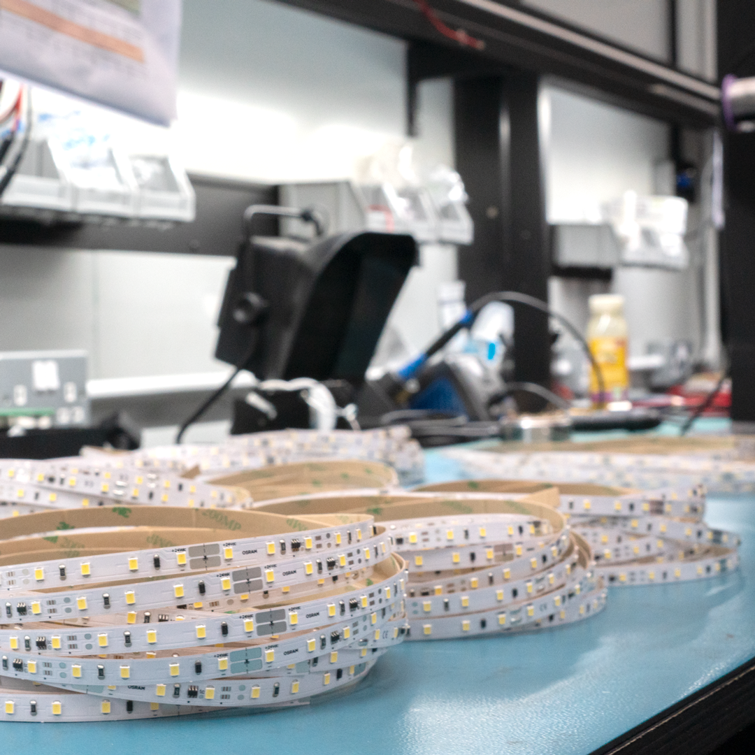 Reels of LED flex on workshop table at Penn Elcom 