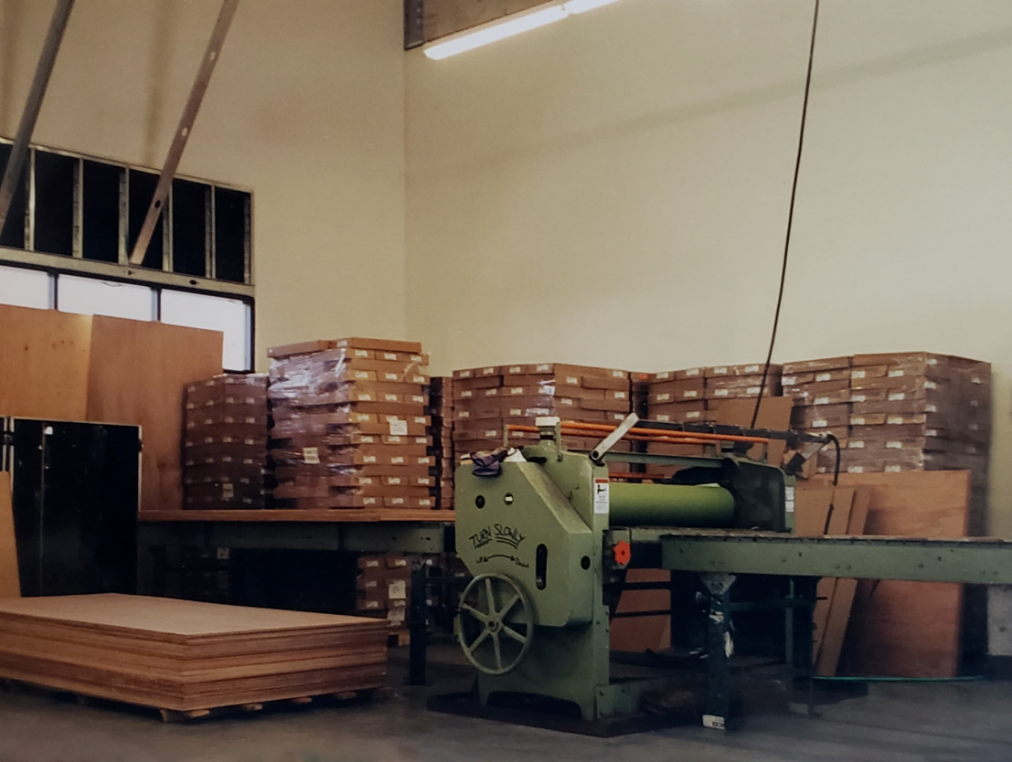 Lamination machine and stacks of boxes behind