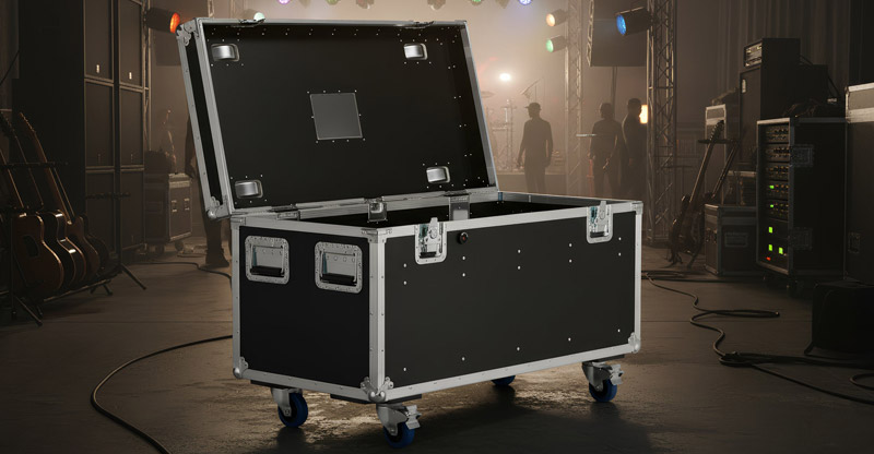 black flight case with open lid and Penn Elcom hardware backstage at an event
