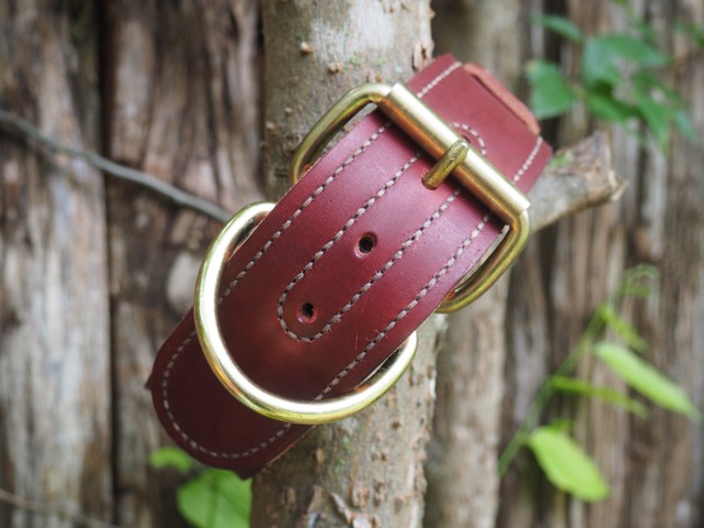 Brandon's latest creation - a refined leather belt with a golden buckle.