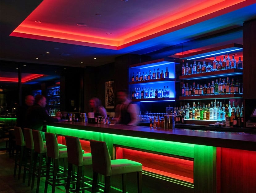 Contemporary bar with red, blue and green LED lighting generated using AI
