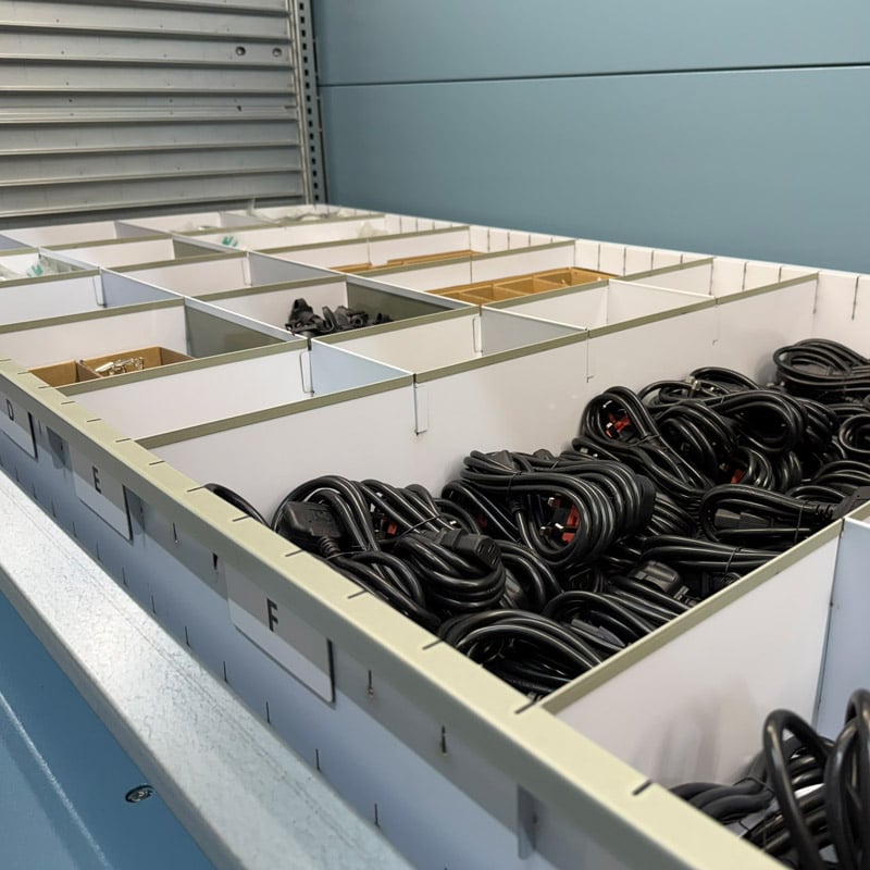 Close up of MDK Tray System in Kardex machine with products