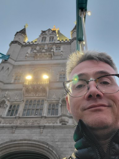 A selfie of Brandon at Tower Bridge, London.