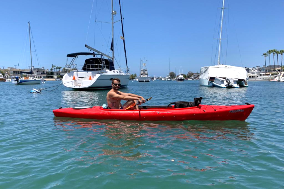 Adam and Rosie on a kayak.