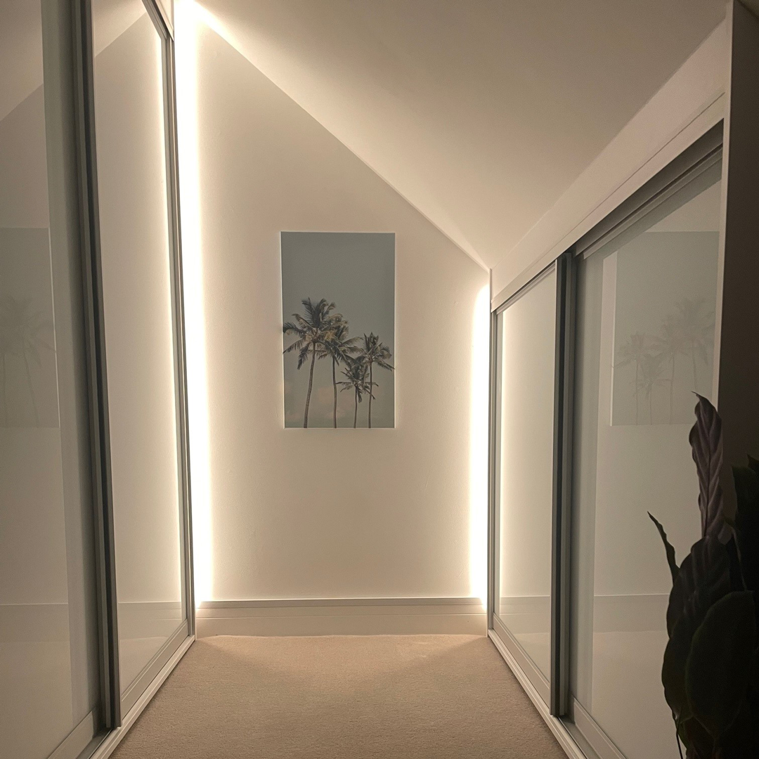 Custom led lighting for Penn Elcom customer with recessed light shining against the wall in attic space