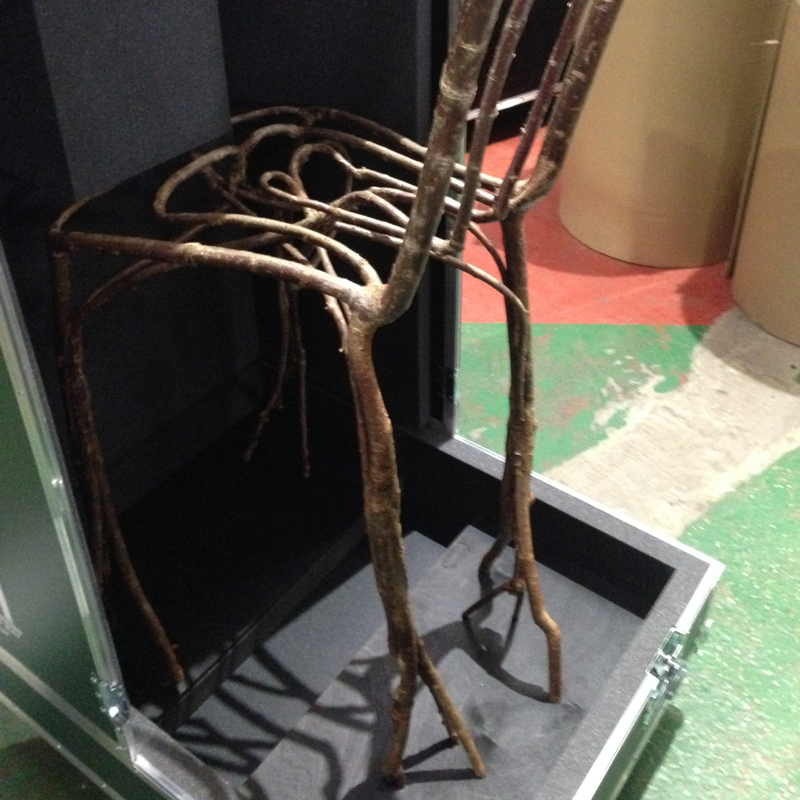 Natural wood chair in flight case